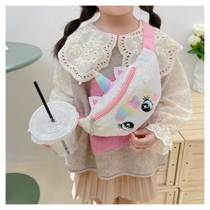 Macro view of sequin unicorn kids bag featuring 3D ears and colorful embroidery details
