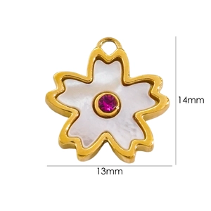 Macro view of a 13x14mm cherry blossom pendant with white shell and pink gemstone