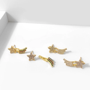 Elegant gold star tassel earrings with colorful zircon stones in a minimalist design