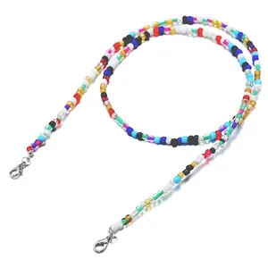 Macro shot of colorful seed bead chain with silver lobster clasps for masks or glasses