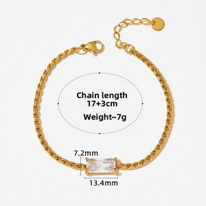 Detail of gold Cuban chain bracelet with rectangular zircon stone and lobster clasp
