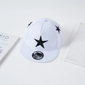 Detail shot of a white flat brim hip hop cap with black five-point star embroidery