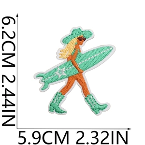 Detailed embroidery patch of a girl with a green surfboard showing 6.2cm x 5.9cm size