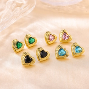 Elegant heart-shaped stainless steel stud earrings with colorful zircons on silk background