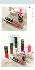 Close-up of matte liquid lipstick set featuring vibrant shades with golden ripple caps