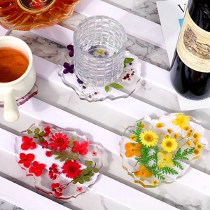 Irregular DIY resin coaster molds with pressed dried flowers and wavy edge design
