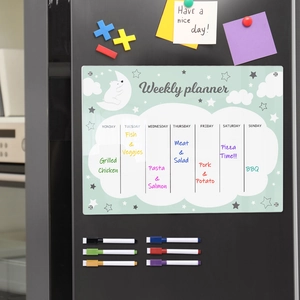 Weekly planner board on fridge with magnetic markers and cute cartoon polar bear design