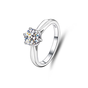 Close-up of S925 sterling silver stamp and 1 carat six-prong moissanite ring setting