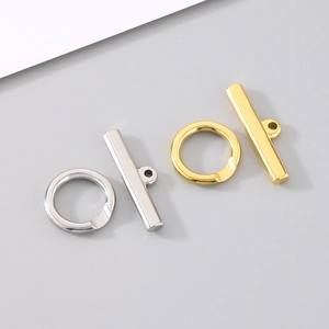 Detailed macro shot of 304 stainless steel heart-shaped OT toggles in gold and silver