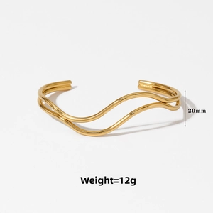 Detail of gold irregular wavy double line open bangle, height 20mm and weight 12g