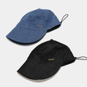 Washed denim wide-brim baseball cap in blue and black with adjustable drawstring
