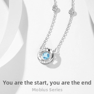 Macro view of Mobius ring silver necklace with a blue gemstone and pavé zircon accents