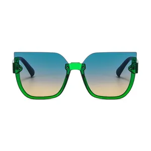 Chic cat eye semi-rimless sunglasses with green frames and gradient lenses