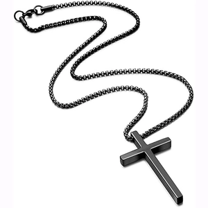Detail of a sleek black titanium steel cross pendant with a matching box chain