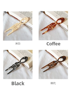 U-shaped acetate hair pins in marble and tortoiseshell patterns for elegant styling