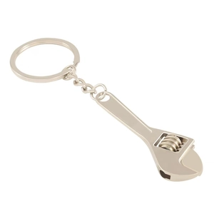 Mini creative silver metal adjustable wrench keychain tool with polished finish on white backdrop
