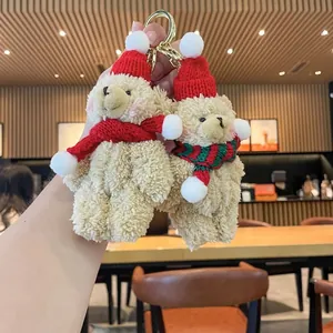 Par de lindos llaveros de oso de peluche con gorros rojos de Navidad y bufandas de lana para bolsos