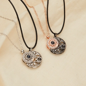 Magnetic sun and moon couple necklace set in silver and rose gold finish with rhinestones