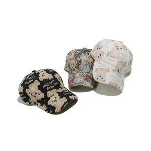 Three-color jacquard baseball caps featuring cute cartoon bear patterns on white background