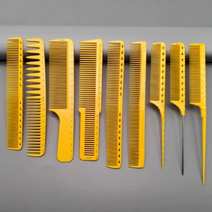 Macro detail of professional yellow hair combs with precision measurement scales