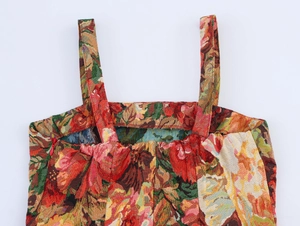 Detail of vintage oil painting style floral jacquard fabric with woven texture on a dress