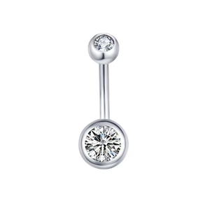 Detail of silver belly button ring with clear round cubic zirconia and curved bar