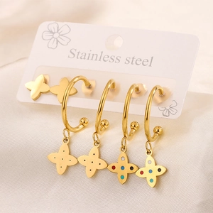 Detailed set of 18K gold plated stainless steel clover earrings on white display card