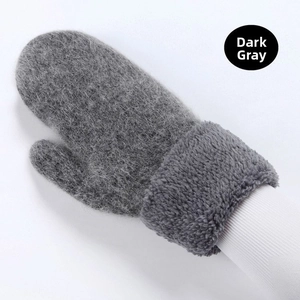 Close-up of thick dark grey thermal mittens featuring warm faux sherpa fleece lining cuffs
