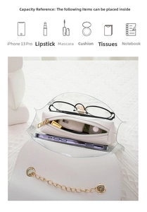 Detail view of mini square bag interior showing high capacity for phone and cosmetics