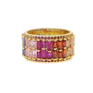 Detailed close-up of rainbow gradient cubic zirconia stones set in a gold ring band
