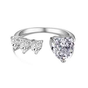 Elegant S925 sterling silver open ring featuring four heart-shaped cubic zirconia stones