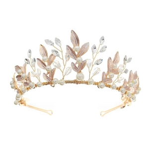 Detail of bridal crown with gold wire, pink gold leaves, crystals and white pearls
