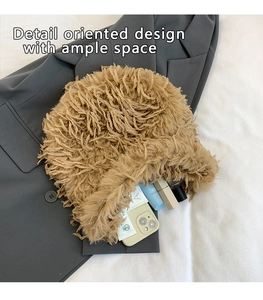 Close-up of khaki plush hobo bag showing fluffy texture and spacious interior storage