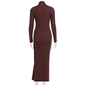 Detail of slim fit long sleeve knit dress with vertical ribbed texture in dark burgundy