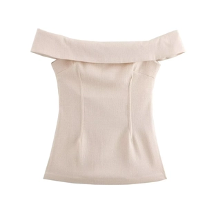 Detailed close-up of beige Bardot top showing princess seams and textured linen-like fabric