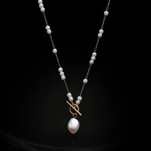 Elegant French baroque pearl long necklace with golden metal chain and OT toggle clasp