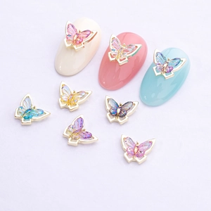 Exquisite butterfly nail charms set in gold alloy with colorful gradient resin wings