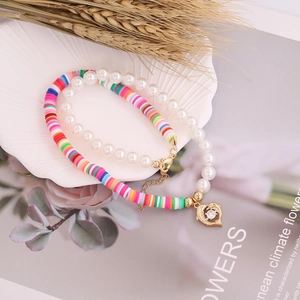 Bohemian double-layer necklace set with pearls, colorful Heishi beads and gold heart pendant