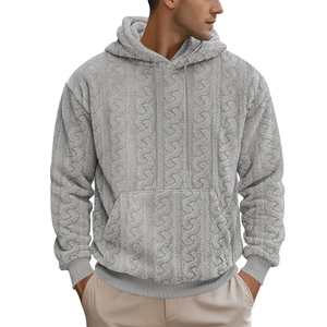 Detailed view of grey teddy fleece textured knit fabric and drawstring hood on hoodie