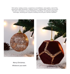 Detail of coffee-colored velvet and gold glitter ornaments hanging on Christmas tree