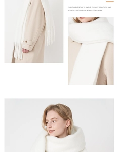 Detail view of soft white faux cashmere scarf with long fringe tassels for winter wear