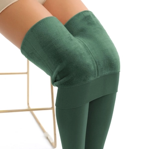 Detail of extra thick dark green fleece lining on high-stretch winter thermal leggings