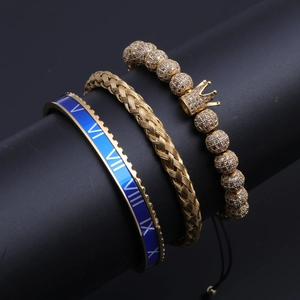 Three-piece set featuring Roman numeral bangle, crown bead chain and braided cable bracelet