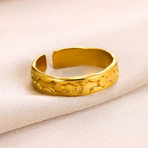 Macro detail of 18k gold-plated irregular ring with traditional Ruyi cloud patterns