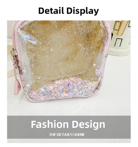 Detail view of pink transparent kids' crossbody bag with colorful flowing star sequins