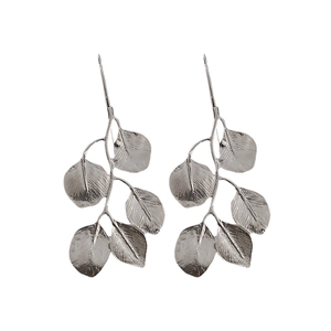 Silver leaf earrings set with detailed metallic veins on a minimalist white background