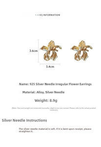 Detailed view of metallic irregular flower earrings with 3.6cm height and 3.4cm width