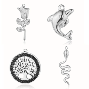 Silver stainless steel charms set featuring rose, dolphin, tree of life, and snake shapes