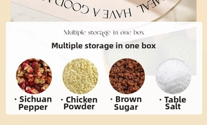 Close-up of four-compartment kitchen seasoning box storing salt and spices