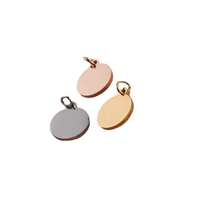 Polished stainless steel round disc pendants in rose gold, silver, and gold finishes